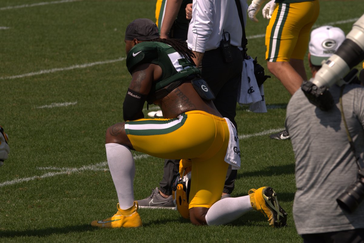 Rashan Gary on one knee