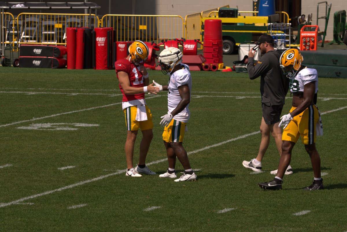 Michael Pratt and Josh Jacobs handshake